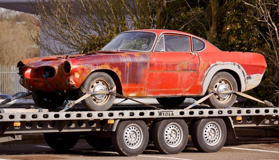 tow truck driver telling man what to do if when your car gets towed